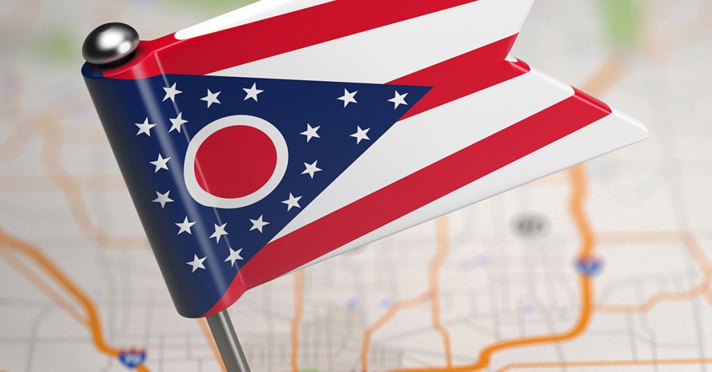 bigstock-Ohio-Small-Flag-on-a-Map-Backg-74992672-1200