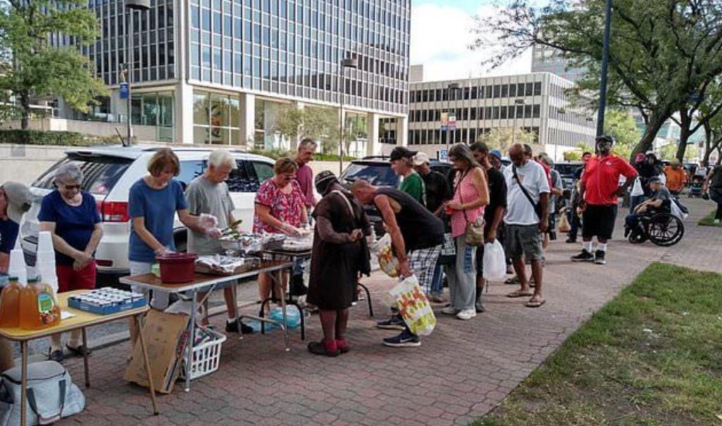 Seriously WTF?? - Kansas City Promises to Stop Pouring Bleach on Food for the Homeless After Outcry. But Will They Find Other Ways to Destroy It? Homeless-outreach-organic-prepper-1024x604