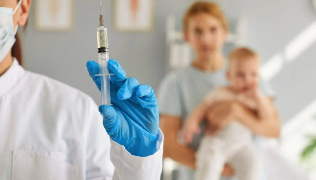 female-professional-nurse-doctor-with-flu-coronavirus-vaccine-1