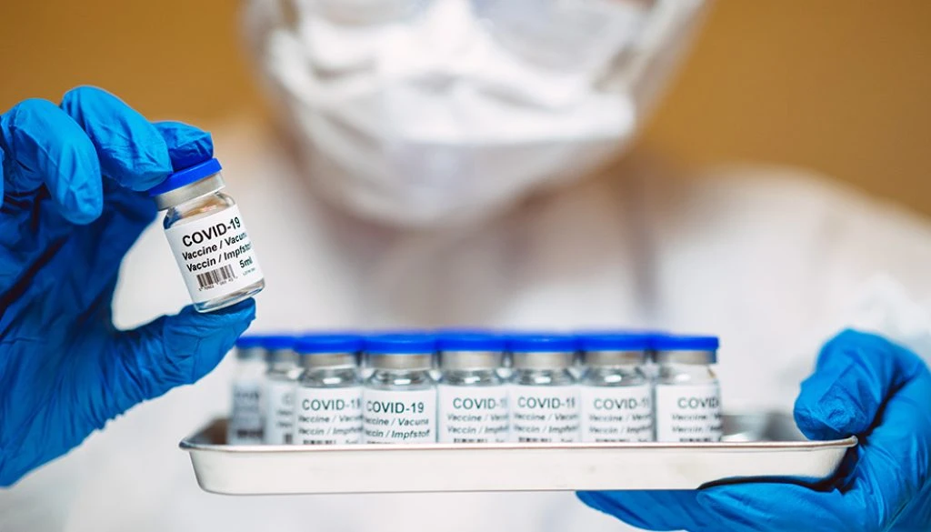 Lab-Tech-Vaccine-Vials-Covid-19