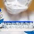 Lab-Tech-Vaccine-Vials-Covid-19
