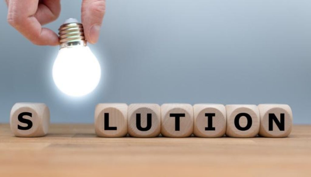 symbol-for-finding-a-solution-dice-and-a-light-bulb-form-the-word-picture-id1134956618