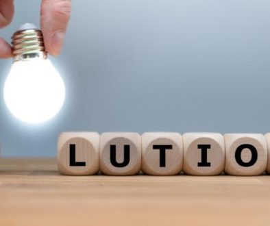 symbol-for-finding-a-solution-dice-and-a-light-bulb-form-the-word-picture-id1134956618