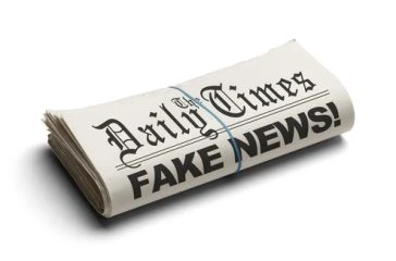 Fake,News,In,The,Daily,Times,Isolated,On,White,Background. Fake,News,In,The,Daily,Times,Isolated,On,White,Background.