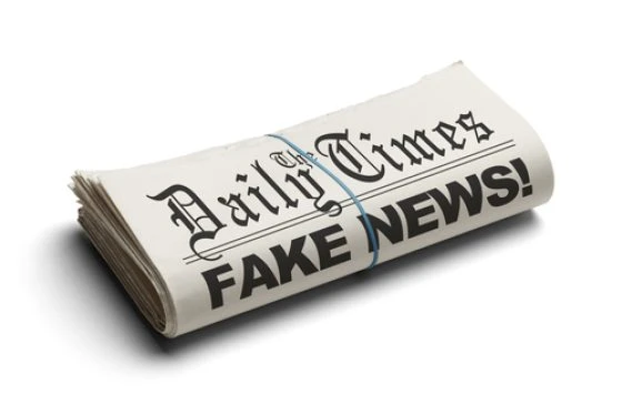 Fake,News,In,The,Daily,Times,Isolated,On,White,Background. Fake,News,In,The,Daily,Times,Isolated,On,White,Background.