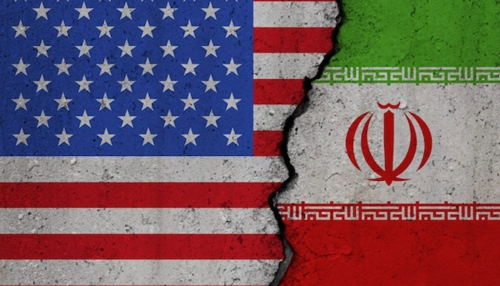 Us,And,Iran,Flags,On,Broken,Concrete