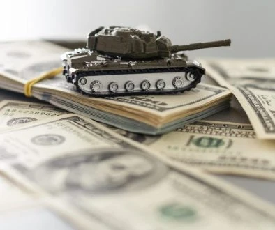 adobe-stock-tank-money-profits-war-tax-scaled