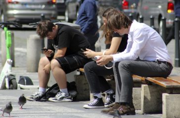 young people, addicted to smartphones, mobile, Wenceslas Square, city center Prague