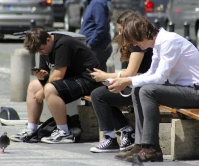 young people, addicted to smartphones, mobile, Wenceslas Square, city center Prague