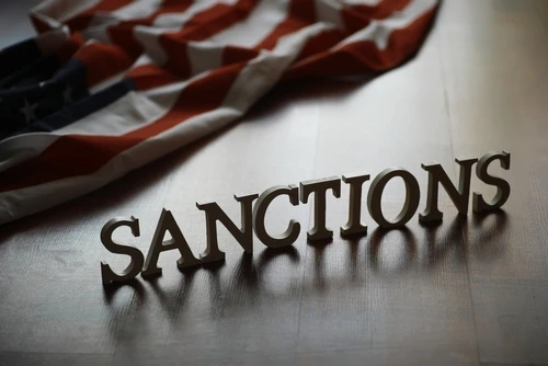 Economic,Sanctions,Concept,With,American,Flag,Background Economic,Sanctions,Concept,With,American,Flag,Background