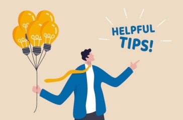 Helpful tips for business, useful ideas or smart trick to success, advice or suggestion information for improvement concept, smart businessman holding lightbulb ideas balloon telling helpful tips.