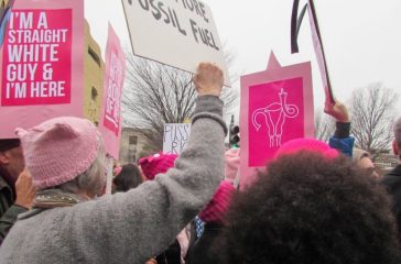 Pink hats and signs at Women's March on Washington.