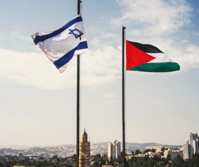 flags of Palestine and Israel against sky and old Jerusalem. Two States for two peoples. Two-state solution concept. Separate ownership of Jerusalem. division of the city between two peoples.