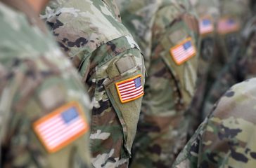 American,Soldiers,And,Flag,Of,Usa,On,Soldiers,Arm.,Us