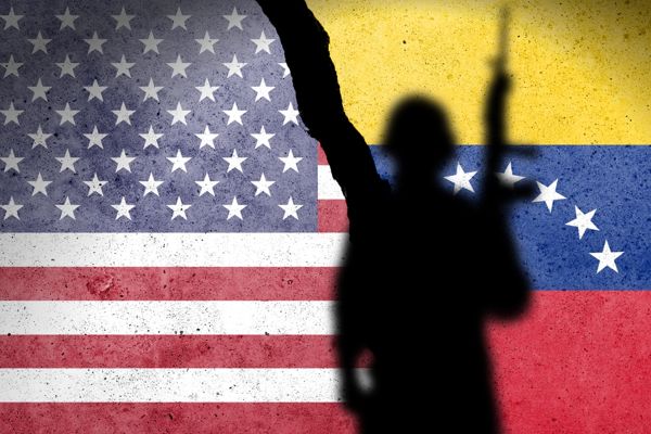Flag,Of,Usa,And,Venezuela,Painted,On,A,Concrete,Wall