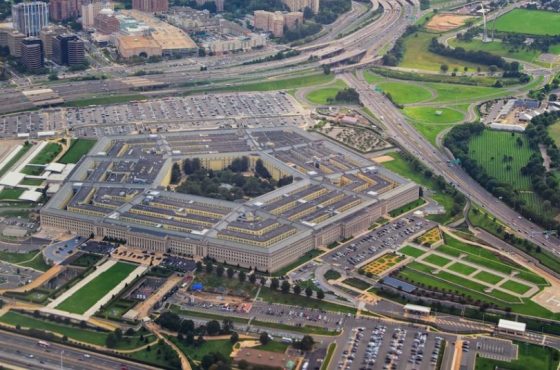 Aerial view of the United States Pentagon, the Department of Defense headquarters in Arlington, Virginia, near Washington DC, with I-395 freeway and the Air Force Memorial and Arlington Cemetery nearb