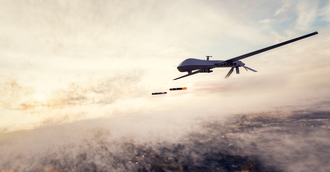 Military combat drone UAV launching missiles Military combat drone UAV launching missiles