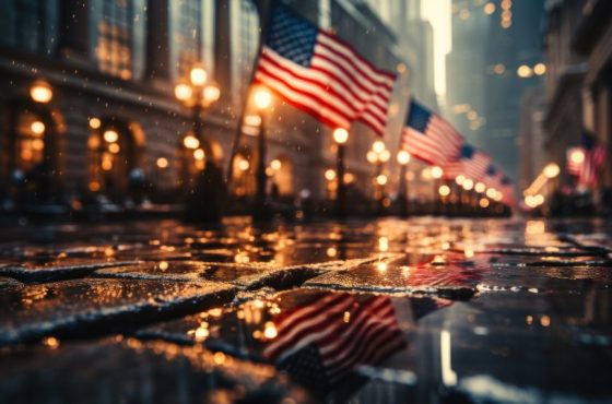 The American flag rises from the ruins and flutters proudly.