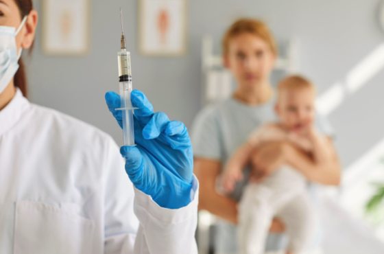 female-professional-nurse-doctor-with-flu-coronavirus-vaccine-1