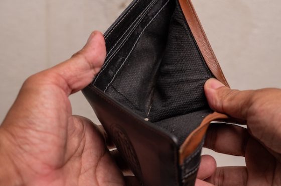 A,Close-up,Of,An,Empty,Wallet,Held,By,A,Person's