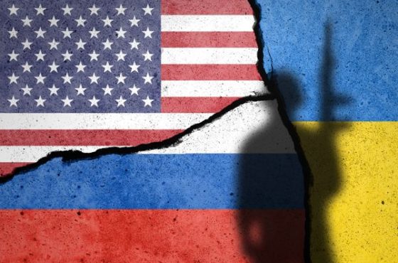 Flags,Of,Us,,Russia,And,Ukraine,Painted,On,Cracked,Wall