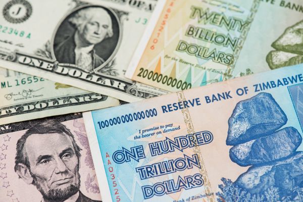 Zimbabwe,Hyperinflation,Dollar,And,Us,Dollar,Currency,Banknotes.,Usa,Dollar