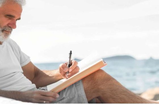 AdobeStock_man-writing-peacefully-alone