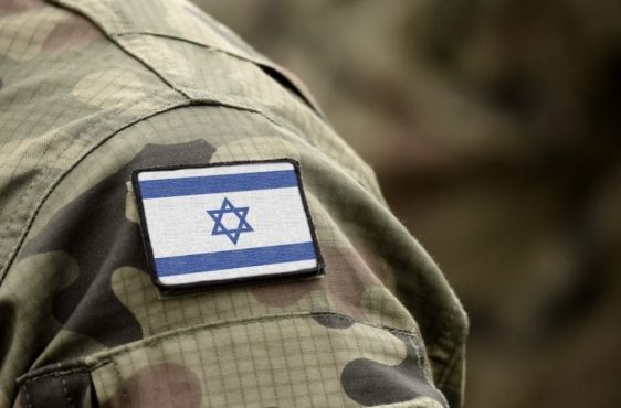 Flag of Israel on military uniform. (collage).